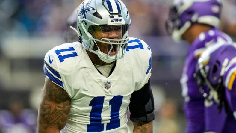 Nov 20, 2022; Minneapolis, Minnesota, USA; Dallas Cowboys linebacker Micah Parsons (11) celebrates during the first quarter against the Minnesota Vikings at U.S. Bank Stadium. Mandatory Credit: Brace Hemmelgarn-USA TODAY Sports