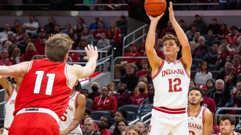Nov 20, 2022; Indianapolis, Indiana, USA; Indiana Hoosiers forward Miller Kopp (12) shoots the ball in the second half against the Miami (Oh) Redhawks at Gainbridge Fieldhouse. Mandatory Credit: Trevor Ruszkowski-USA TODAY Sports