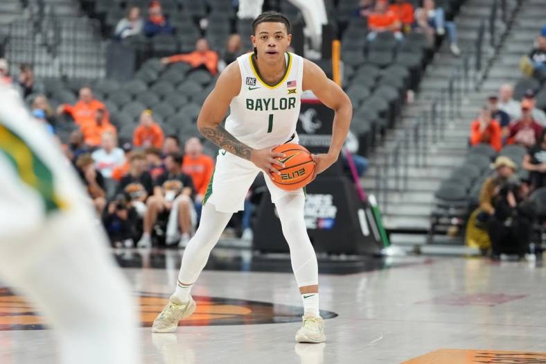 Nov 20, 2022; Las Vegas, Nevada, USA; Baylor Bears guard Keyonte George (1) looks for an open team mate against the Baylor Bears during the second half at T-Mobile Arena. Mandatory Credit: Stephen R. Sylvanie-USA TODAY Sports