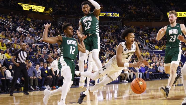 Nov 20, 2022; Ann Arbor, Michigan, USA;  Michigan Wolverines guard Kobe Bufkin (2) is fouled by Ohio Bobcats guard Jaylin Hunter (12) in the first half at Crisler Center. Mandatory Credit: Rick Osentoski-USA TODAY Sports