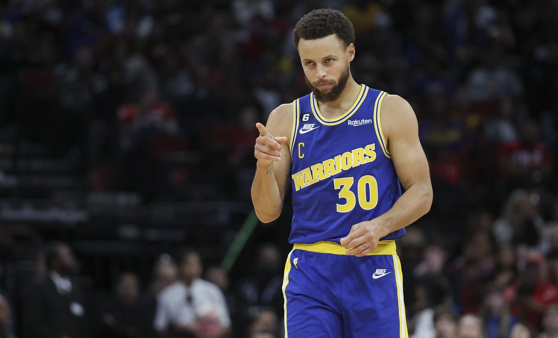 Nov 20, 2022; Houston, Texas, USA; Golden State Warriors guard Stephen Curry (30) reacts after a play during the fourth quarter against the Houston Rockets at Toyota Center. Mandatory Credit: Troy Taormina-USA TODAY Sports