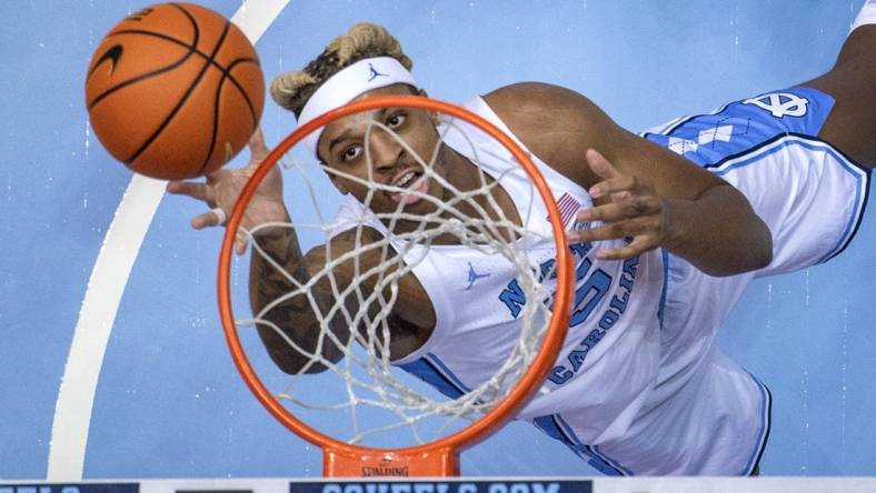 Nov 20, 2022; Chapel Hill, North Carolina, USA; North Carolina Tar Heels forward Armando Bacot (5) shoots in the first half at Dean E. Smith Center. Mandatory Credit: Bob Donnan-USA TODAY Sports