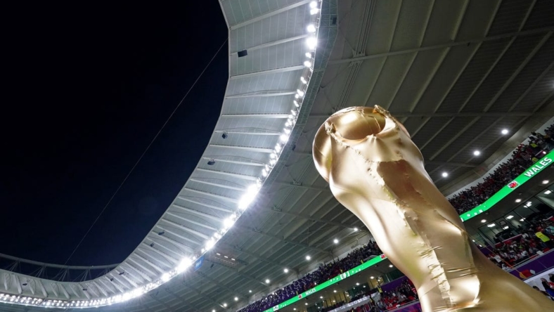 Nov 21, 2022; Al Rayyan, Qatar; A general view of a large replica World Cup trophy before a group stage match between Wales and the United States of America during the 2022 FIFA World Cup Wales at Ahmed Bin Ali Stadium. Mandatory Credit: Danielle Parhizkaran-USA TODAY Sports