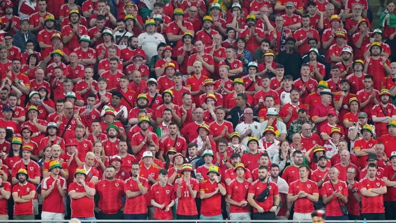 Nov 21, 2022; Al Rayyan, Qatar; Wales fans watch against the United States of America during the second half during a group stage match during the 2022 FIFA World Cup at Ahmed Bin Ali Stadium. Mandatory Credit: Danielle Parhizkaran-USA TODAY Sports