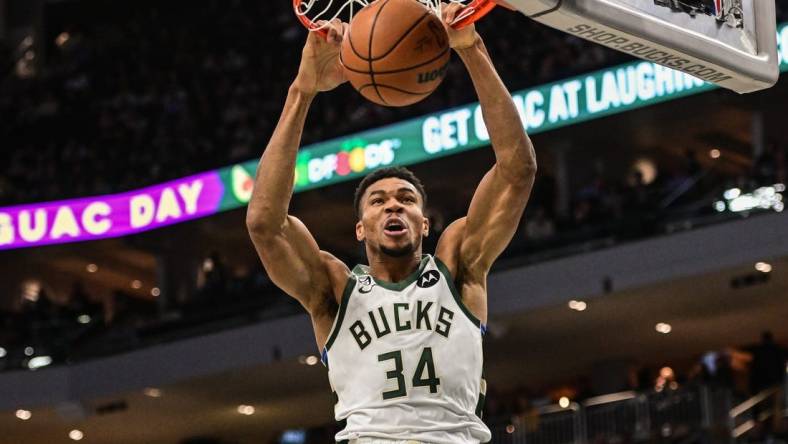 Nov 21, 2022; Milwaukee, Wisconsin, USA; Milwaukee Bucks forward Giannis Antetokounmpo (34) dunks a basket in the first quarter during game against the Portland Trail Blazers at Fiserv Forum. Mandatory Credit: Benny Sieu-USA TODAY Sports