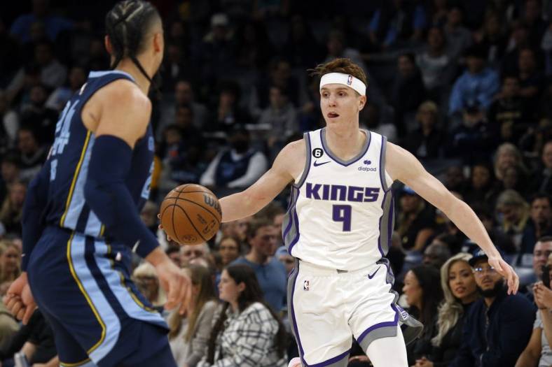 Nov 22, 2022; Memphis, Tennessee, USA; Sacramento Kings guard Kevin Huerter (9) dribbles during the first half against the Memphis Grizzlies at FedExForum. Mandatory Credit: Petre Thomas-USA TODAY Sports