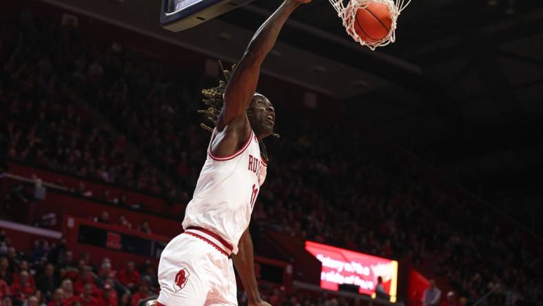 Nov 22, 2022; Piscataway, New Jersey, USA; Rutgers Scarlet Knights center Clifford Omoruyi (11) dunks the ball during the second half against the Rider Broncs at Jersey Mike's Arena. Mandatory Credit: Vincent Carchietta-USA TODAY Sports