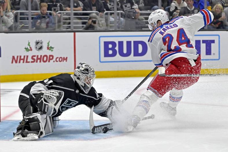 Nov 22, 2022; Los Angeles, California, USA;  Los Angeles Kings goaltender Cal Petersen (40) makes a save off a shot on goal by New York Rangers right wing Kaapo Kakko (24) in the third period at Crypto.com Arena. Mandatory Credit: Jayne Kamin-Oncea-USA TODAY Sports