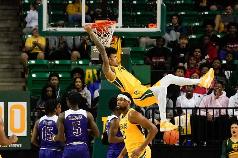 Nov 23, 2022; Waco, Texas, USA;  Baylor Bears forward Jalen Bridges (11) dunks the ball against the McNeese State Cowboys during the first half at Ferrell Center. Mandatory Credit: Chris Jones-USA TODAY Sports