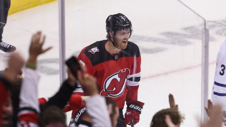 11/23/2022;  Newark, NJ, USA;  New Jersey Devils defenseman Dougie Hamilton (7) celebrates his goal against the Toronto Maple Leafs during the third period at the Prudential Center.  Mandatory Credit: Ed Mulholland-USA TODAY Sports