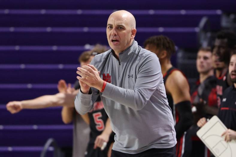 Nov 23, 2022; Fort Myers, Florida, USA;  Utah Utes head coach Craig Smith calls a play in the second half against the Mississippi State Bulldogs during the Fort Myers Tip-Off Beach Division championship game at Suncoast Credit Union Arena. Mandatory Credit: Nathan Ray Seebeck-USA TODAY Sports