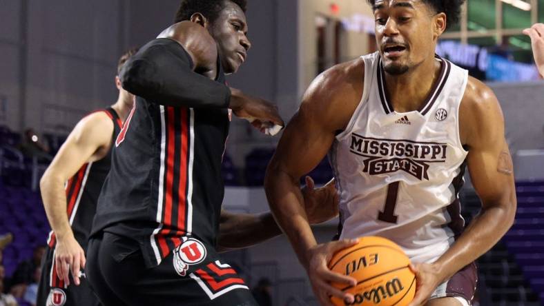 Nov 23, 2022; Fort Myers, Florida, USA;  Mississippi State Bulldogs forward Tolu Smith (1) drives to the hoop past Utah Utes center Keba Keita (13) in the second half during the Fort Myers Tip-Off Beach Division championship game at Suncoast Credit Union Arena. Mandatory Credit: Nathan Ray Seebeck-USA TODAY Sports