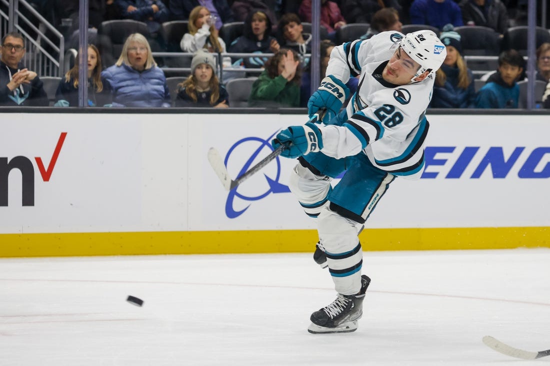 Nov 23, 2022; Seattle, Washington, USA; San Jose Sharks right wing Timo Meier (28) scores a goal against the Seattle Kraken during the second period at Climate Pledge Arena. Mandatory Credit: Joe Nicholson-USA TODAY Sports