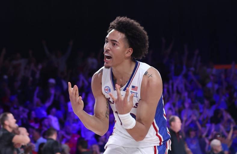 Nov 24, 2022; Paradise Island, BAHAMAS; Kansas Jayhawks forward Jalen Wilson (10) reacts after the win against the Wisconsin Badgers in overtime at Imperial Arena. Mandatory Credit: Kevin Jairaj-USA TODAY Sports