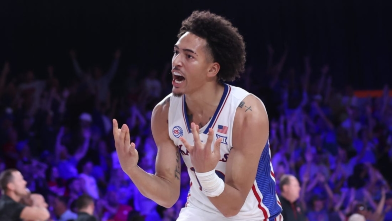 Nov 24, 2022; Paradise Island, BAHAMAS; Kansas Jayhawks forward Jalen Wilson (10) reacts after the win against the Wisconsin Badgers in overtime at Imperial Arena. Mandatory Credit: Kevin Jairaj-USA TODAY Sports