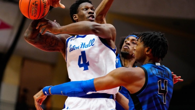 Nov 24, 2022; Orlando, Florida, USA; Seton Hall Pirates forward Tyrese Samuel (4) is defended by Memphis Tigers forward Chandler Lawson (4) during the second half at ESPN Wide World of Sports. Mandatory Credit: Rich Storry-USA TODAY Sports