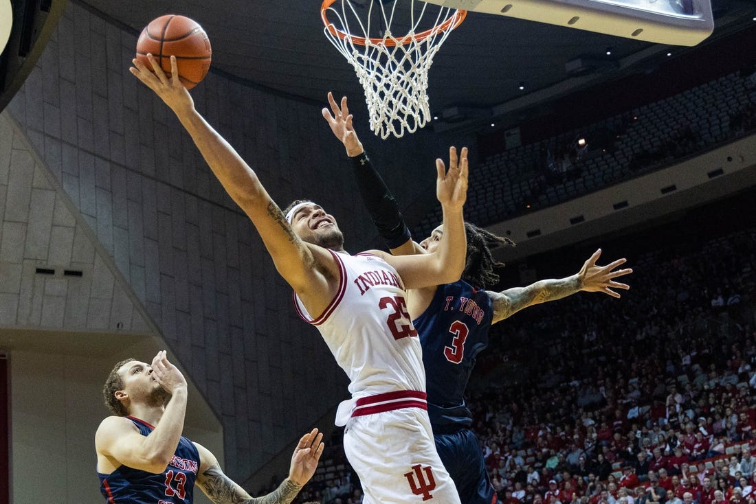 Nov 25, 2022; Bloomington, Indiana, USA; Indiana Hoosiers forward Race Thompson (25) shoots the ball while Jackson State Tigers forward Trace Young (3) defends in the first half at Simon Skjodt Assembly Hall. Mandatory Credit: Trevor Ruszkowski-USA TODAY Sports