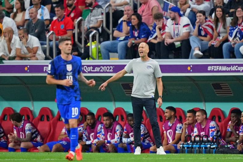Nov 25, 2022; Al Khor, Qatar; United States of America manager Gregg Berhalter directs his team against England during the first half of a group stage match during the 2022 World Cup at Al Bayt Stadium. Mandatory Credit: Danielle Parhizkaran-USA TODAY Sports