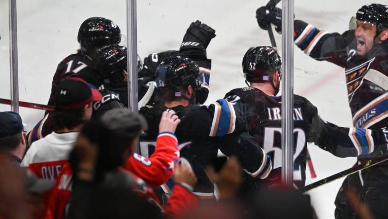 Nov 25, 2022; Washington, District of Columbia, USA;  Washington Capitals left wing Alex Ovechkin (8) reacts after right wing T.J. Oshie (77) scores during the first period against the Calgary Flames at Capital One Arena. Mandatory Credit: Tommy Gilligan-USA TODAY Sports