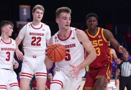 Nov 25, 2022; Paradise Island, BAHAMAS; Wisconsin Badgers forward Tyler Wahl (5) dribbles the ball during the second half against the USC Trojans at Imperial Arena. Mandatory Credit: Kevin Jairaj-USA TODAY Sports