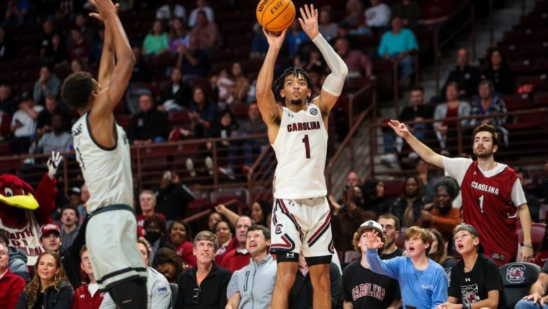 Nov 25, 2022; Charleston, South Carolina, USA; South Carolina Gamecocks guard Jacobi Wright (1) shoots against the USC Upstate Spartans in the first half at Colonial Life Arena. Mandatory Credit: Jeff Blake-USA TODAY Sports