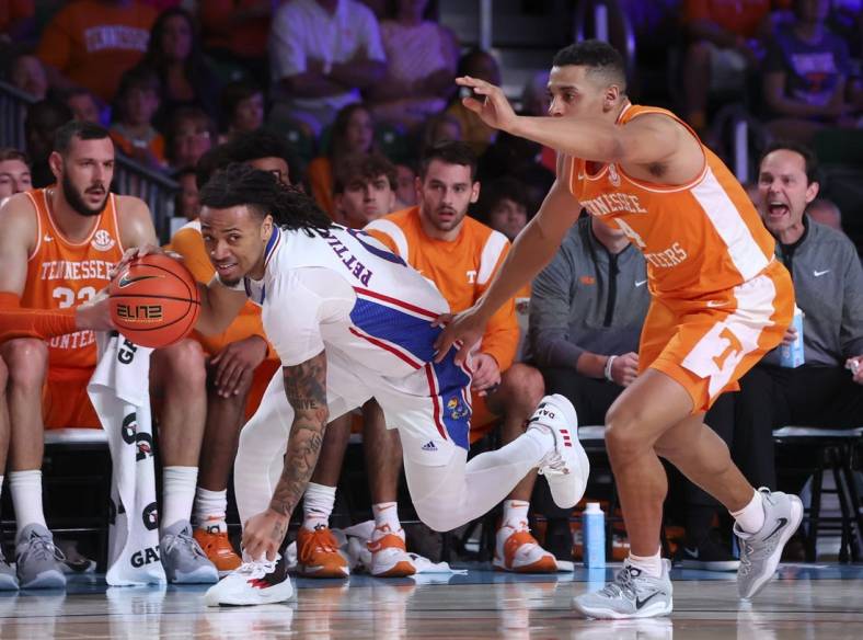 Nov 25, 2022; Paradise Island, BAHAMAS; Kansas Jayhawks guard Bobby Pettiford Jr. (0) drives to the basket as Tennessee Volunteers guard Tyreke Key (4) defends during the first half at Imperial Arena. Mandatory Credit: Kevin Jairaj-USA TODAY Sports