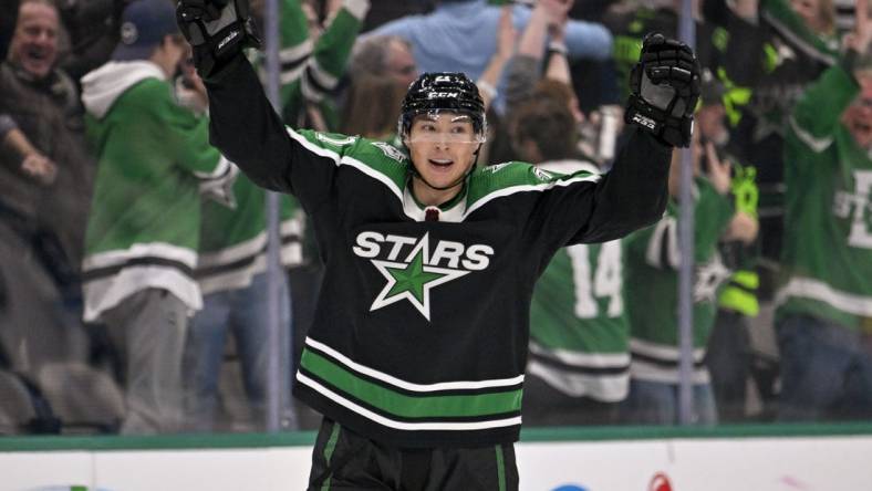 Nov 25, 2022; Dallas, Texas, USA; Dallas Stars left wing Jason Robertson (21) celebrates scoring the game tying  goal against the Winnipeg Jets during the third period at the American Airlines Center. Mandatory Credit: Jerome Miron-USA TODAY Sports