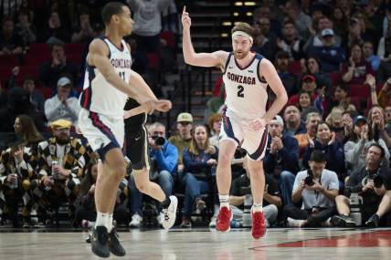 Nov 25, 2022; Portland, Oregon, USA;  Gonzaga Bulldogs forward Drew Timme (2) celebrates after scoring a basket during the second half against the Purdue Boilermakers at Moda Center. Purdue won the game 84-66. Mandatory Credit: Troy Wayrynen-USA TODAY Sports