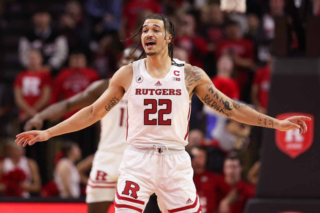 Nov 26, 2022; Piscataway, New Jersey, USA; Rutgers Scarlet Knights guard Caleb McConnell (22) sets back on defense during the second half against the Central Connecticut State Blue Devils at Jersey Mike's Arena. Mandatory Credit: Vincent Carchietta-USA TODAY Sports