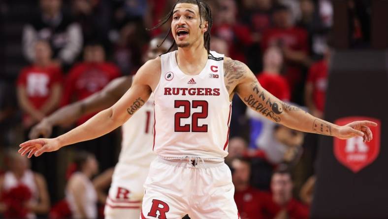 Nov 26, 2022; Piscataway, New Jersey, USA; Rutgers Scarlet Knights guard Caleb McConnell (22) sets back on defense during the second half against the Central Connecticut State Blue Devils at Jersey Mike's Arena. Mandatory Credit: Vincent Carchietta-USA TODAY Sports