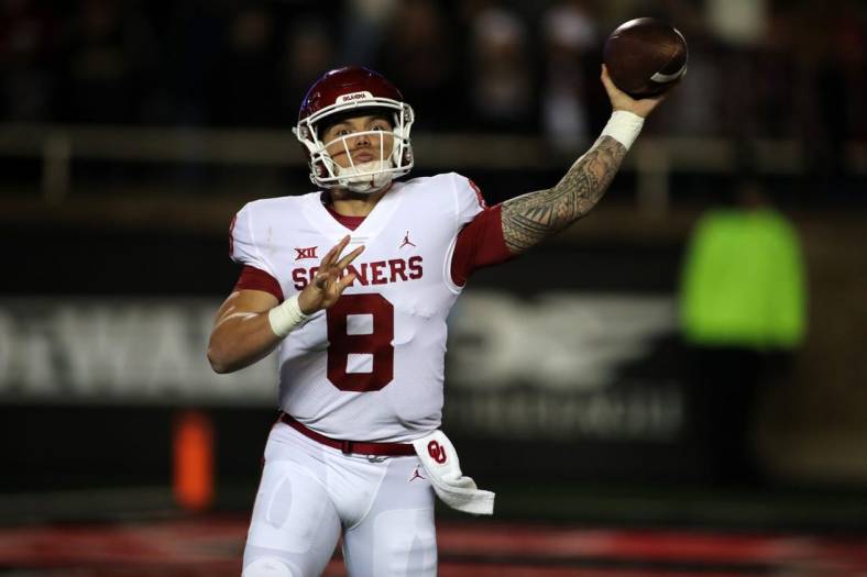 Nov 26, 2022; Lubbock, Texas, USA;  Oklahoma Sooners quarterback Dillon Gabriel (10) throws a pass against the Texas Tech Red Raiders in the first half at Jones AT&T Stadium and Cody Campbell Field. Mandatory Credit: Michael C. Johnson-USA TODAY Sports