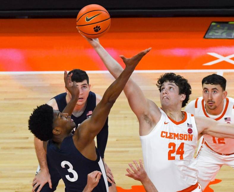 Clemson sophomore forward PJ Hall (24) tips off with Penn State forward Kebba Njie (3) during the first half at Littlejohn Coliseum Tuesday, November 29, 2022.

Clemson Basketball Vs Penn State University Acc Big 10 Challenge