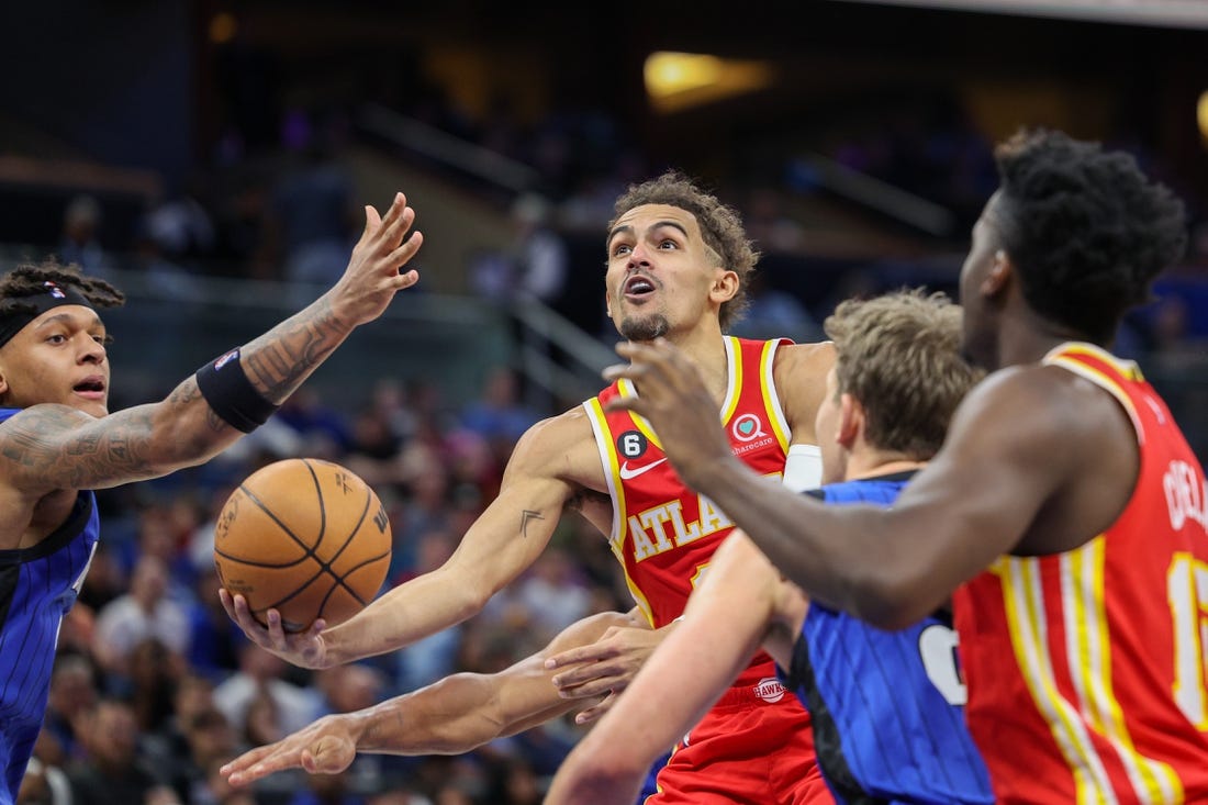 Nov 30, 2022; Orlando, Florida, USA;  Atlanta Hawks guard Trae Young (11) drives to the hoop against the Orlando Magic in the second quarter at Amway Center. Mandatory Credit: Nathan Ray Seebeck-USA TODAY Sports