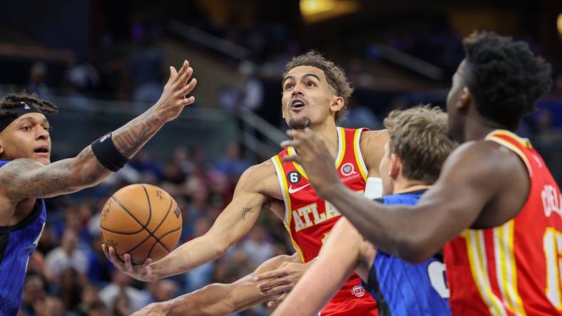 Nov 30, 2022; Orlando, Florida, USA;  Atlanta Hawks guard Trae Young (11) drives to the hoop against the Orlando Magic in the second quarter at Amway Center. Mandatory Credit: Nathan Ray Seebeck-USA TODAY Sports