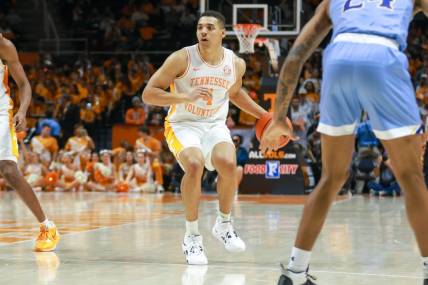 Nov 30, 2022; Knoxville, Tennessee, USA; Tennessee Volunteers guard Tyreke Key (4) brings the ball up court against the McNeese State Cowboys at Thompson-Boling Arena. Mandatory Credit: Randy Sartin-USA TODAY Sports