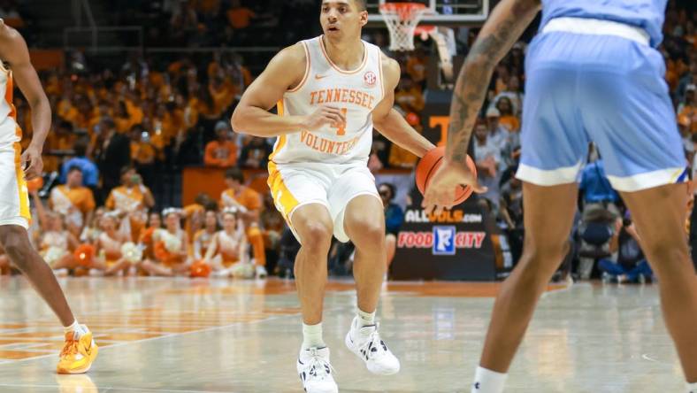 Nov 30, 2022; Knoxville, Tennessee, USA; Tennessee Volunteers guard Tyreke Key (4) brings the ball up court against the McNeese State Cowboys at Thompson-Boling Arena. Mandatory Credit: Randy Sartin-USA TODAY Sports