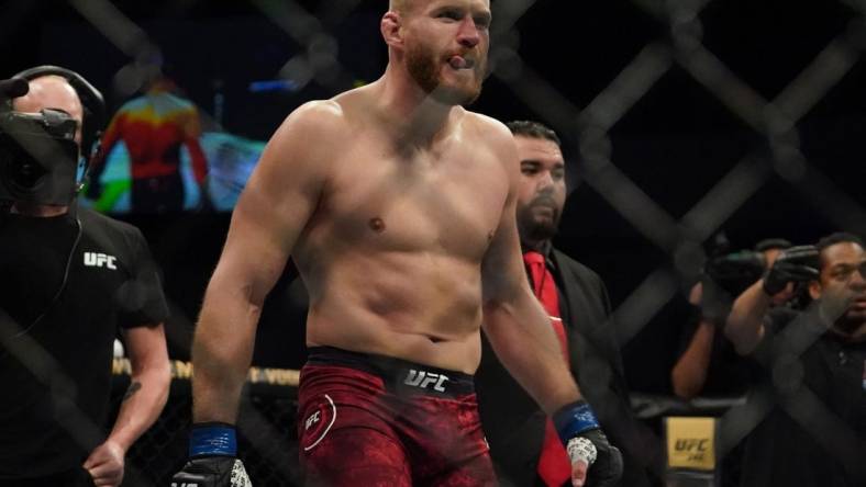 Feb 15, 2020; Rio Rancho, New Mexico, USA; Corey Anderson (red) fights Jan Blachowicz (blue) in the light heavyweight bout during UFC Fight Night at Santa Ana Star Arena. Mandatory Credit: Kirby Lee-USA TODAY Sports