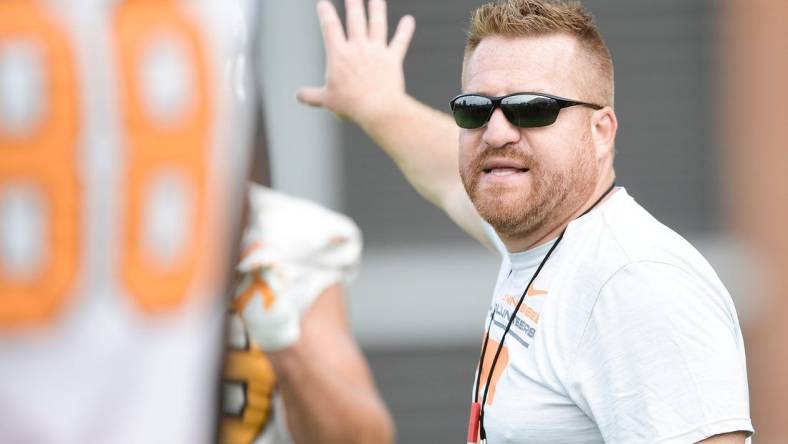 Tennessee Offensive Coordinator Alex Golesh calls during fall practice at Haslam Field in Knoxville, Tenn. on Thursday, Aug. 5, 2021.

Kns Tennessee Fall Practice