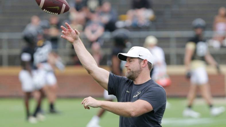 Purdue assistant coach Brian Brohm during practice, Friday, Aug. 6, 2021 at Ross-Ade Stadium in West Lafayette.

Purdue Football Camp