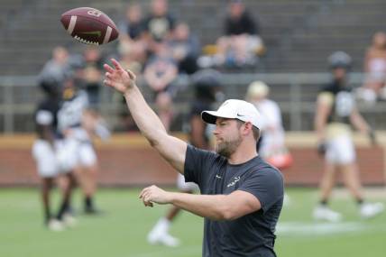 Purdue assistant coach Brian Brohm during practice, Friday, Aug. 6, 2021 at Ross-Ade Stadium in West Lafayette.

Purdue Football Camp