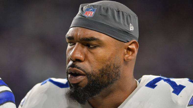 Oct 31, 2021; Minneapolis, Minnesota, USA; Dallas Cowboys offensive tackle Tyron Smith (77) looks on during the game against the Minnesota Vikings at U.S. Bank Stadium. Mandatory Credit: Jeffrey Becker-USA TODAY Sports