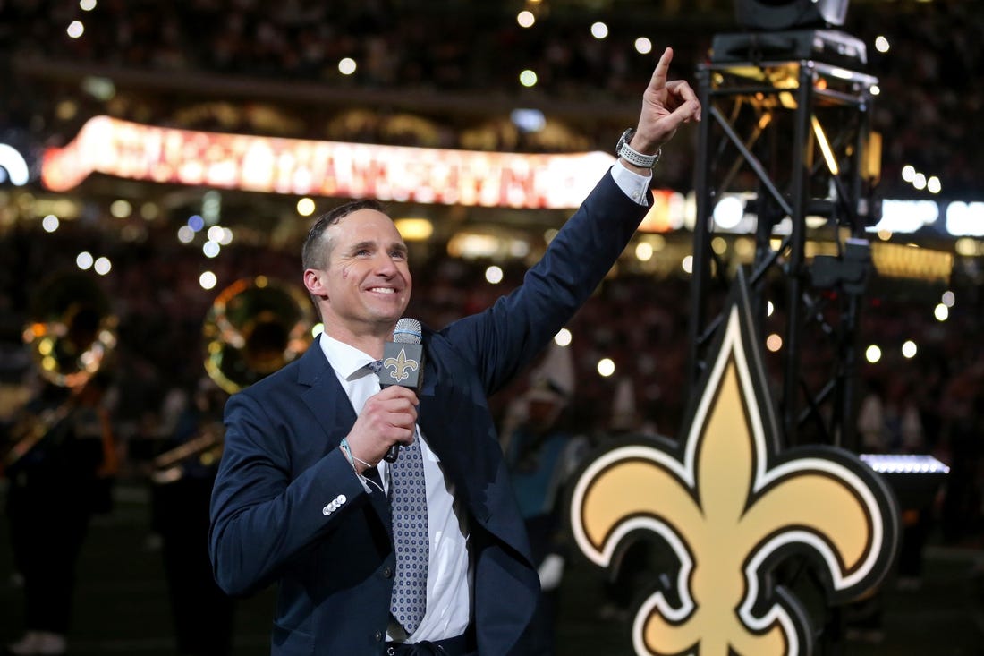 Nov 25, 2021; New Orleans, Louisiana, USA; Former New Orleans Saints quarterback Drew Brees is honored at halftime of the game between the New Orleans Saints and the Buffalo Bills at the Caesars Superdome. Mandatory Credit: Chuck Cook-USA TODAY Sports