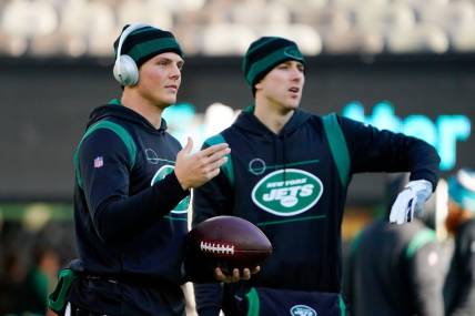 New York Jets quarterbacks Zach Wilson, left, and Mike White signal to receivers during warmups at MetLife Stadium on Sunday, Dec. 26, 2021, in East Rutherford.

Nyj Vs Jax
