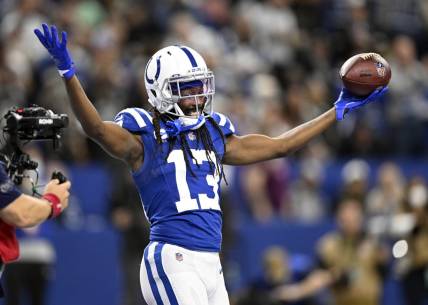 Jan 2, 2022; Indianapolis, Indiana, USA;  Indianapolis Colts wide receiver T.Y. Hilton (13) celebrates a touchdown during the second half against the Las Vegas Raiders at Lucas Oil Stadium.  Raiders won 23-20.  Mandatory Credit: Marc Lebryk-USA TODAY Sports