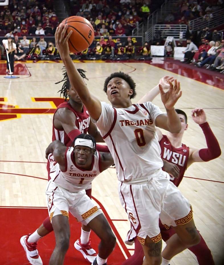 Feb 20, 2022; Los Angeles, California, USA;  USC Trojans guard Boogie Ellis (0) drives up for a basket in the first half against the Washington State Cougars at Galen Center. Mandatory Credit: Jayne Kamin-Oncea-USA TODAY Sports