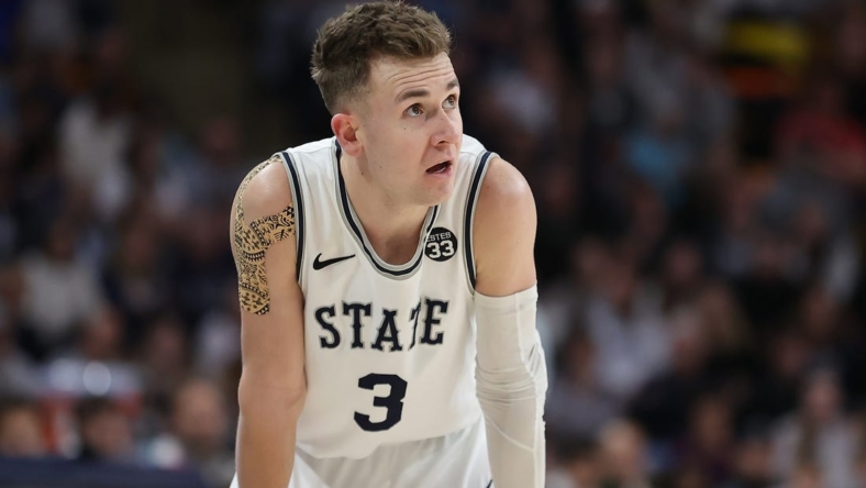 Feb 26, 2022; Logan, Utah, USA; Utah State Aggies guard Steven Ashworth (3) reacts to a play in the second half against the Colorado State Rams at Dee Glen Smith Spectrum. Mandatory Credit: Rob Gray-USA TODAY Sports