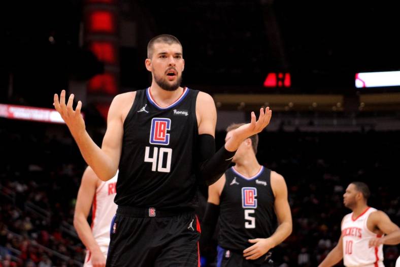 Feb 27, 2022; Houston, Texas, USA; LA Clippers center Ivica Zubac (40) reacts to a foul call against the Houston Rockets during the fourth quarter at Toyota Center. Mandatory Credit: Erik Williams-USA TODAY Sports