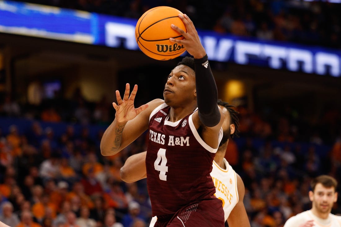 Mar 13, 2022; Tampa, FL, USA; Texas A&M Aggies guard Wade Taylor IV (4) drives to the basket against the Tennessee Volunteers in the second half at Amelie Arena. Mandatory Credit: Nathan Ray Seebeck-USA TODAY Sports