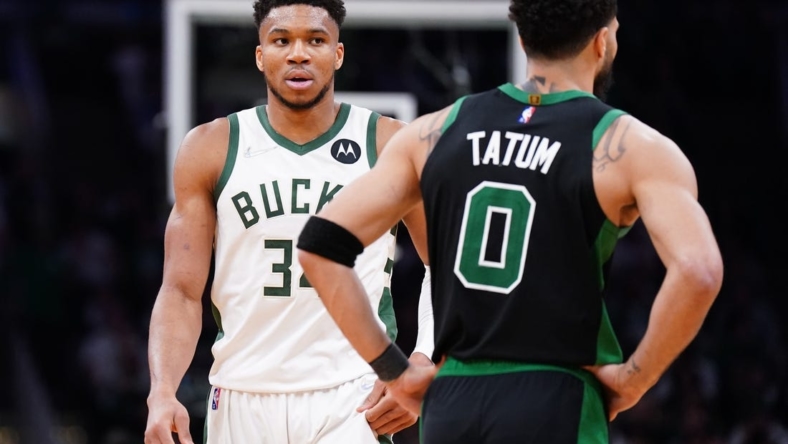 May 1, 2022; Boston, Massachusetts, USA; Milwaukee Bucks forward Giannis Antetokounmpo (34) and Boston Celtics forward Jayson Tatum (0) on the court in the second half during game one of the second round for the 2022 NBA playoffs at TD Garden. Mandatory Credit: David Butler II-USA TODAY Sports
