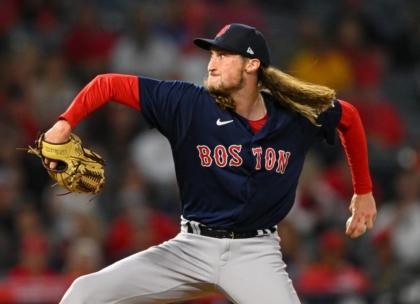 Jun 8, 2022; Anaheim, California, USA;  Boston Red Sox relief pitcher Matt Strahm (55) throws during the ninth inning earning a save to defeat the Los Angeles Angels for their 14th loss in a row at Angel Stadium. Mandatory Credit: Jayne Kamin-Oncea-USA TODAY Sports